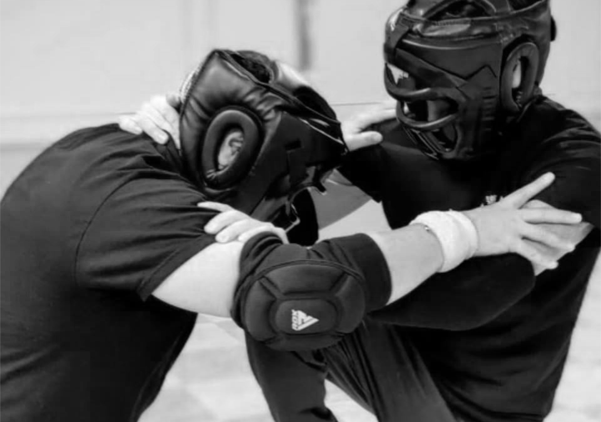 Students sparring in headgear
